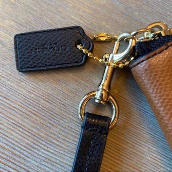 Coach colorblock wristlet. 100% authentic. Measures 8 1/2” x 5 3/4”. - Picture 3 of 3